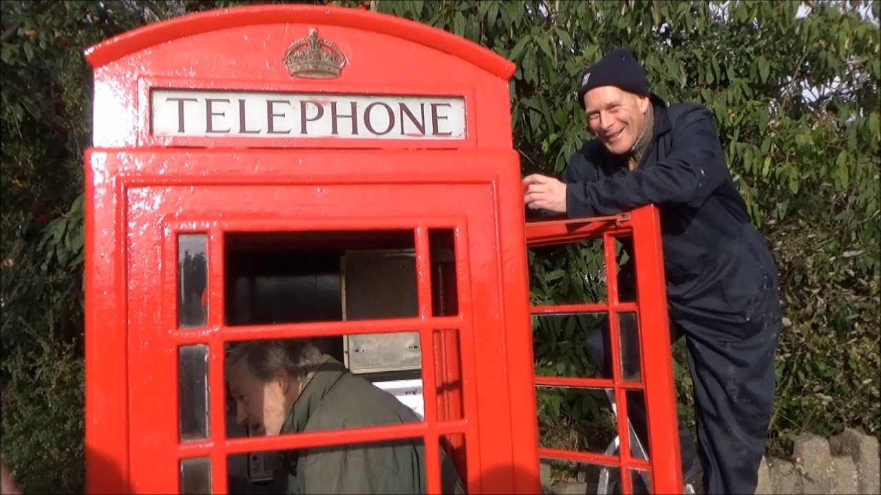 Restoring the village phone box.Part 5.Red paint on