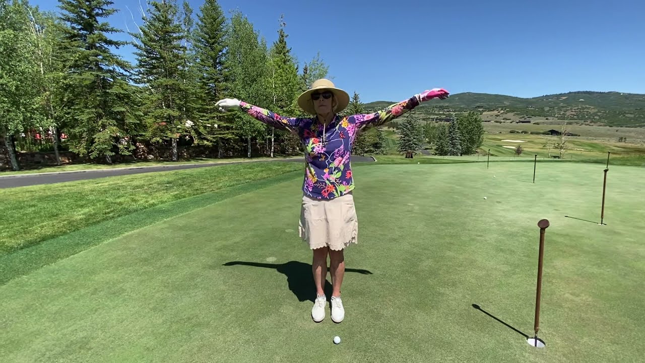 Part 2: Easy putting golf lesson. Using gravity and heavy arms to swing the putter.
