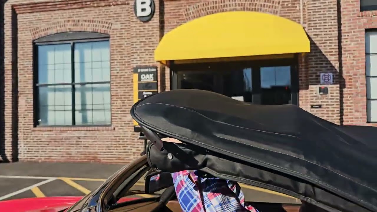 How to put the soft top down on a 1984 Alfa Romeo 
