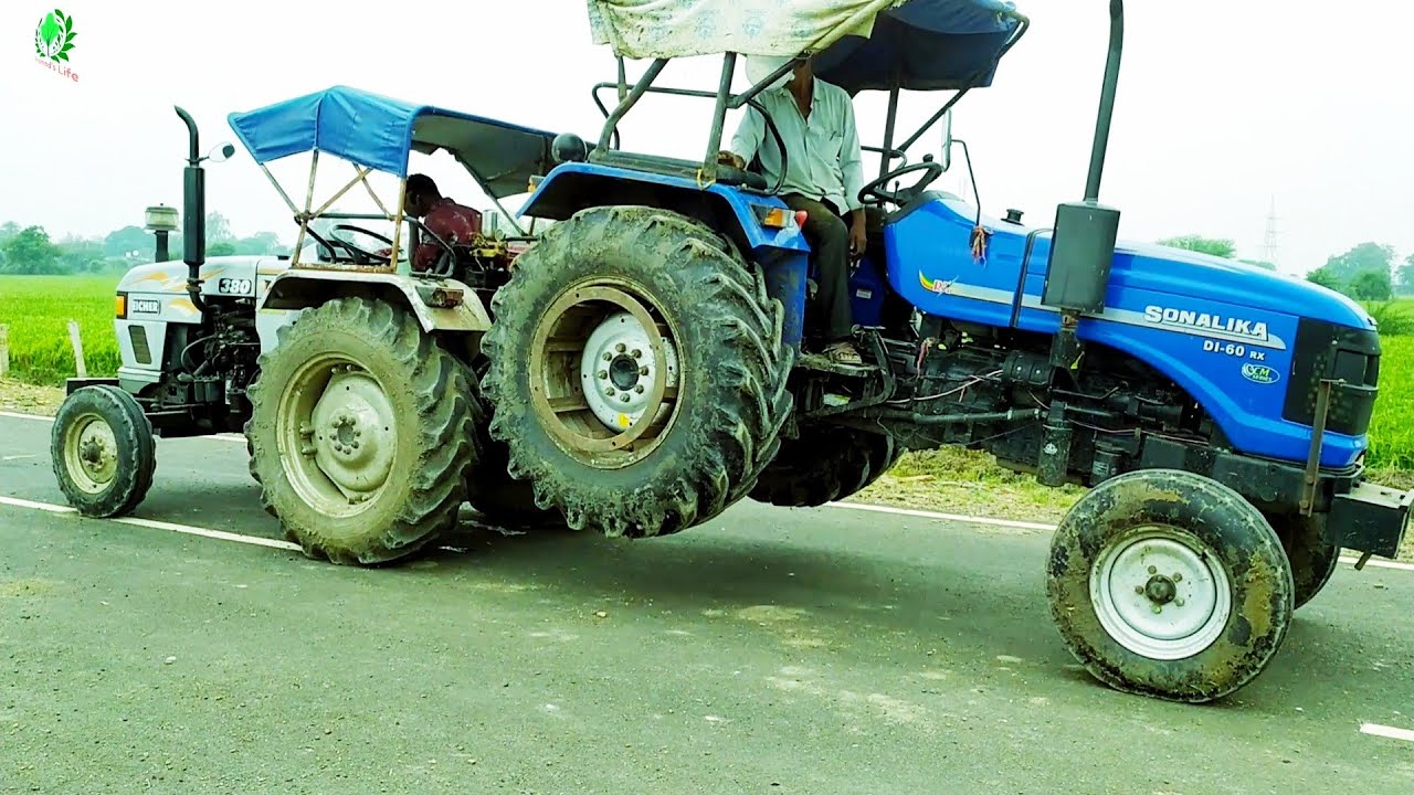 Sonalika 60 Rx get Puncher Pulling by Eicher 380 Tractor