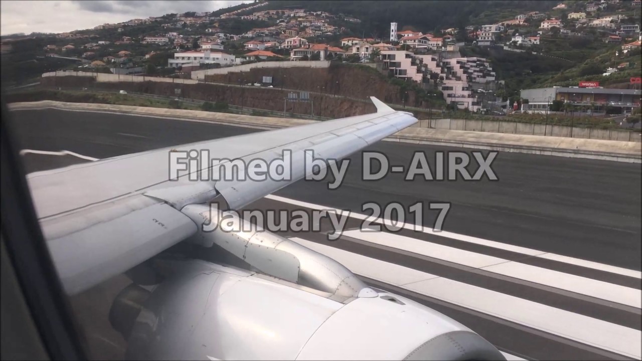 Takeoff from Madeiras dangerous Cristiano Ronaldo Airport with TAP Airbus A319