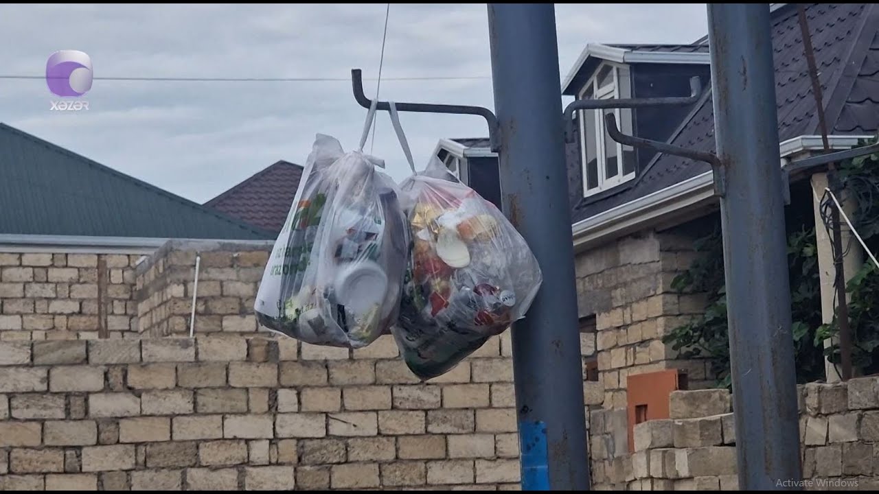 &ldquo;Torbalara yığılaraq divardan asılıb&rdquo; -  Mehdiabadda məişət tullantıları PROBLEMİ