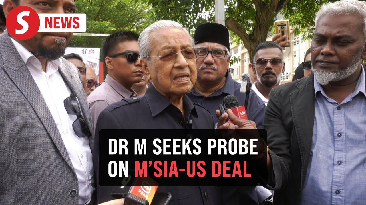 Dr M lodges police report against PM over US trade deal