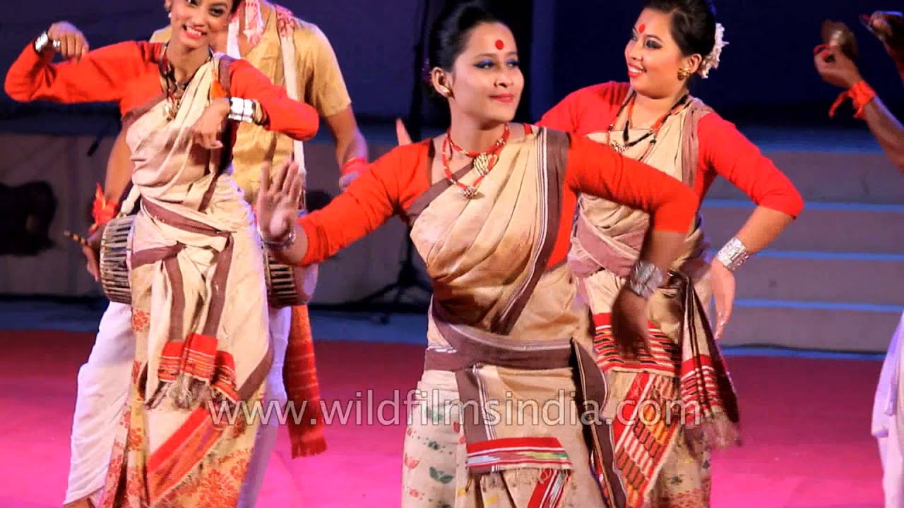 Assamese women present signature Bihu dance