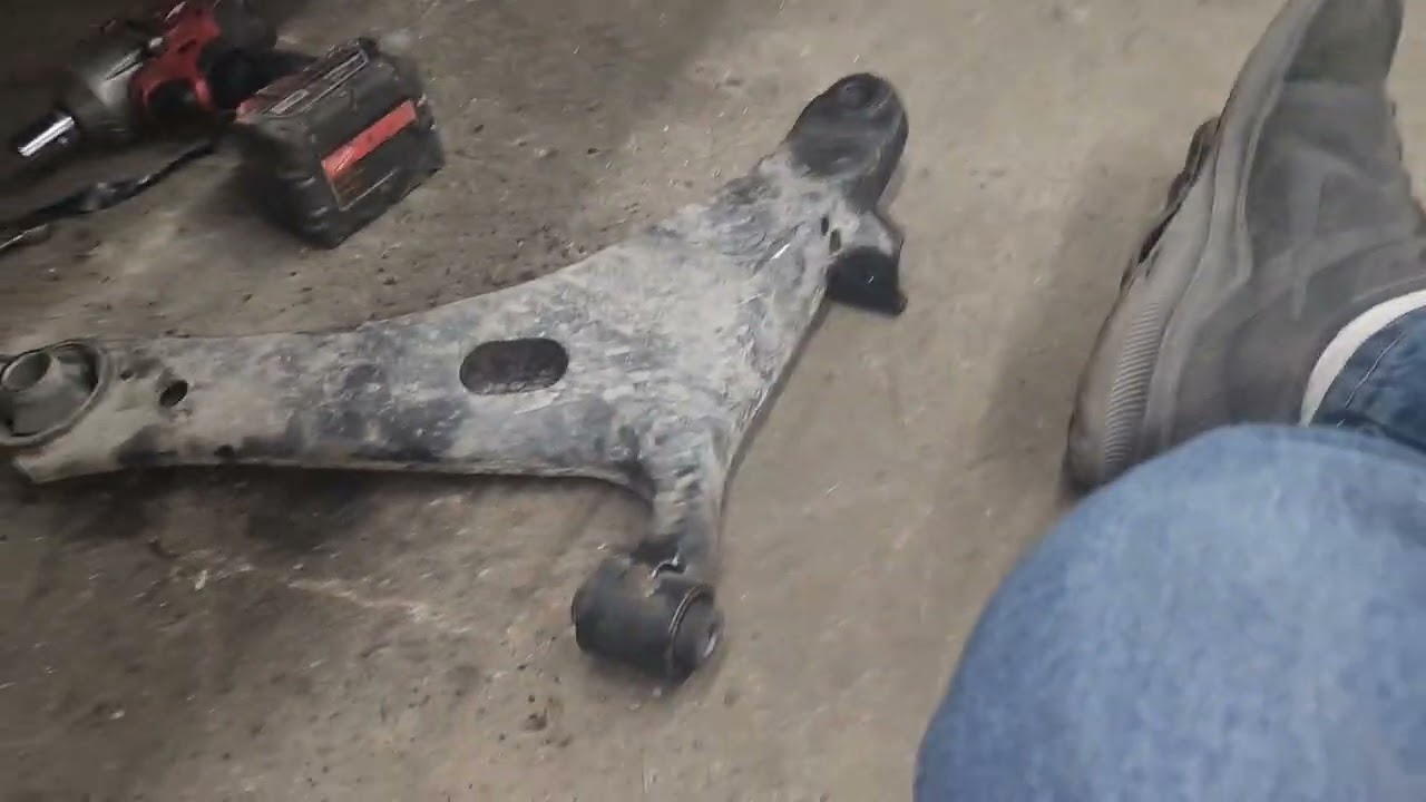 09 subaru legacy control arm bushing replacement