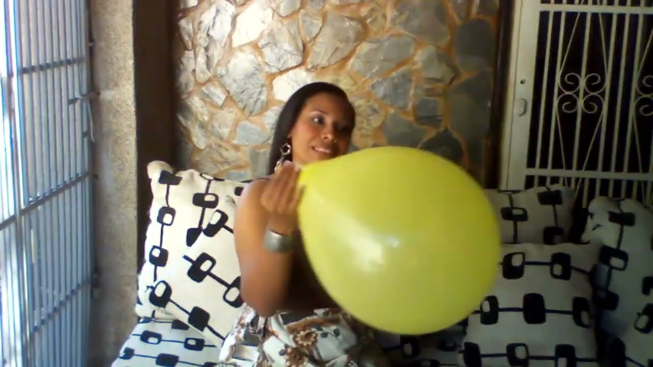 Blowing big balloons to bust