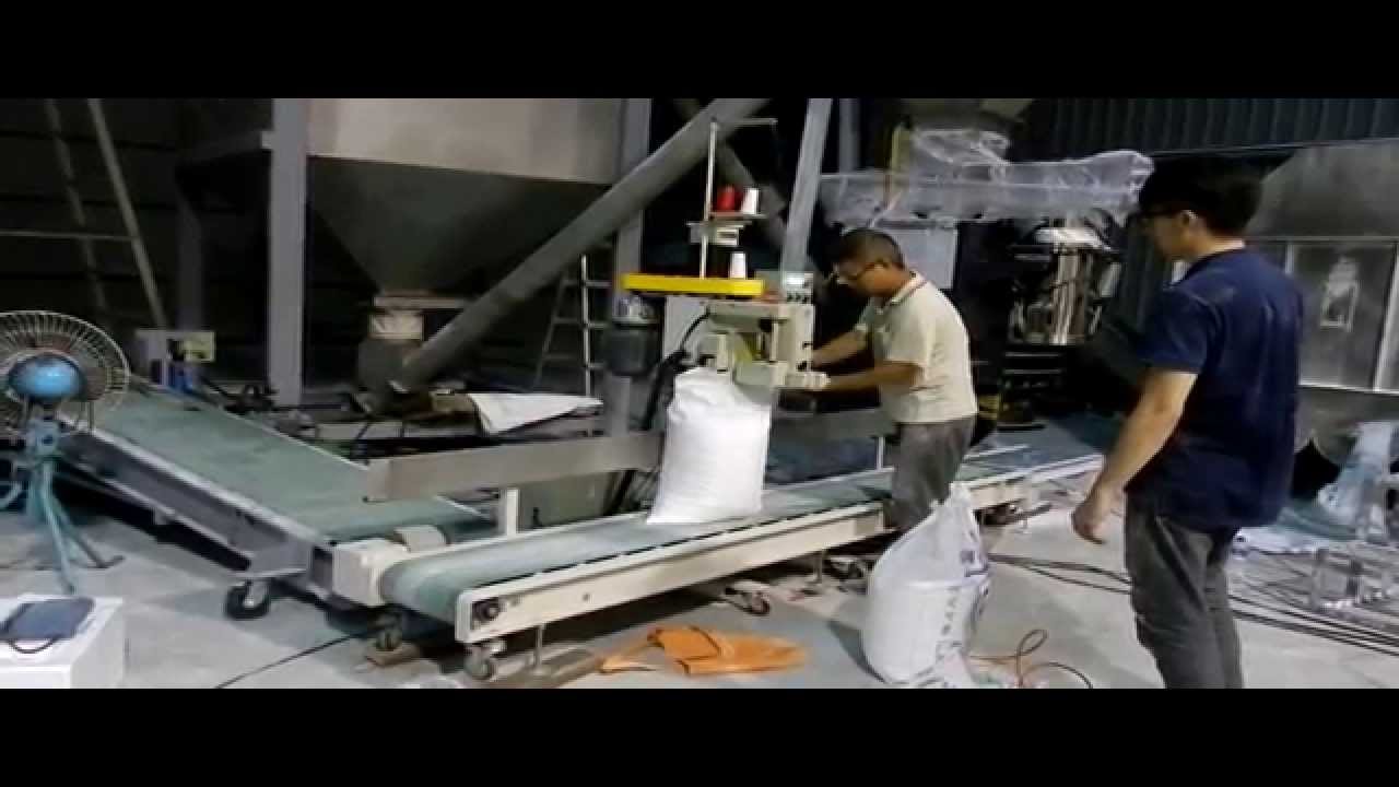 MTX-PB: BAG CLOSING MACHINE WITH PEDESTAL AND CONVEYOR