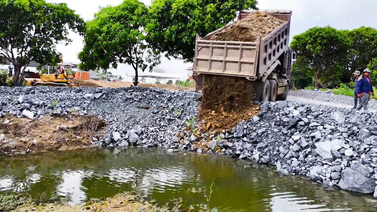 NICE SITE, Great land filling using 10 wheel trucks and Dozer KomatSu