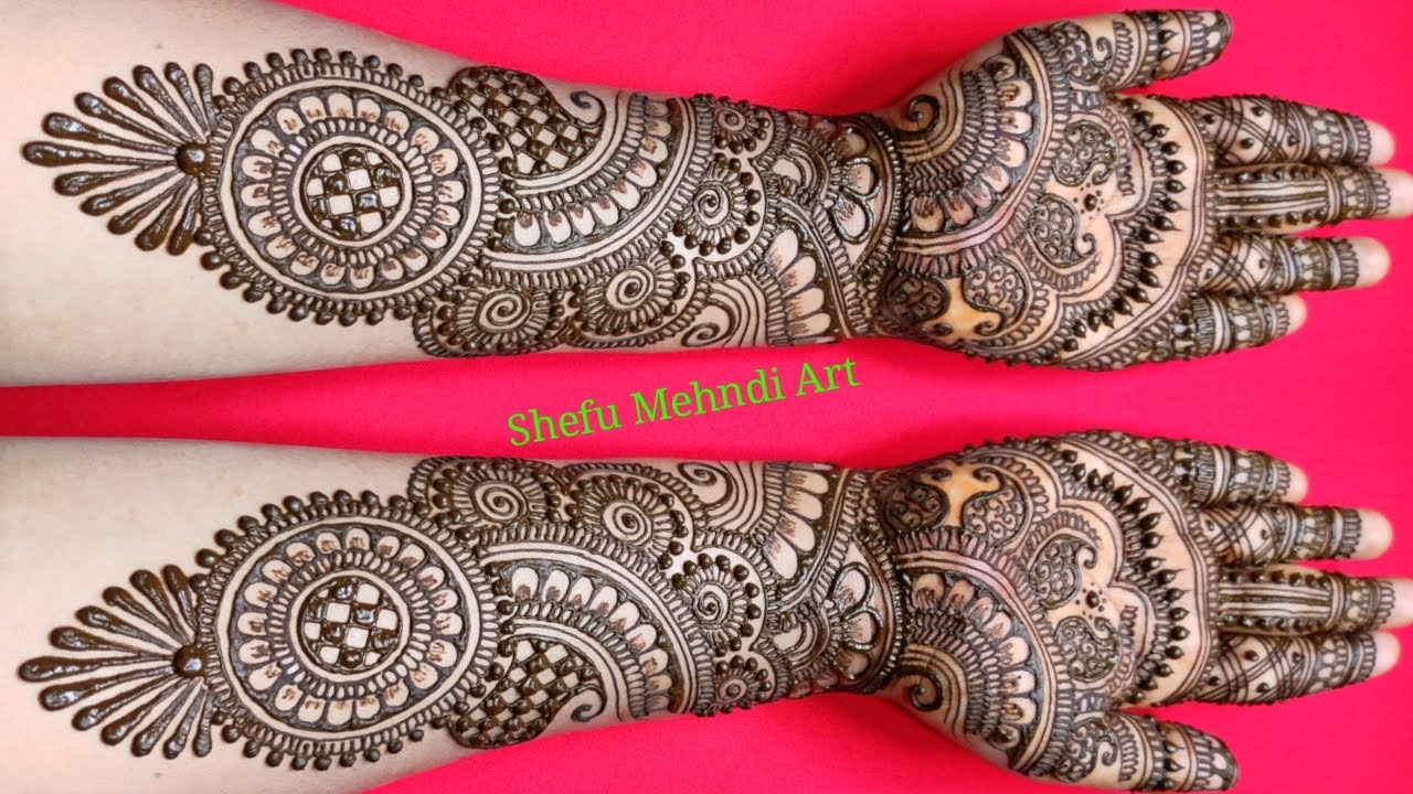 Latest unique dulhan mehndi designs for front hands