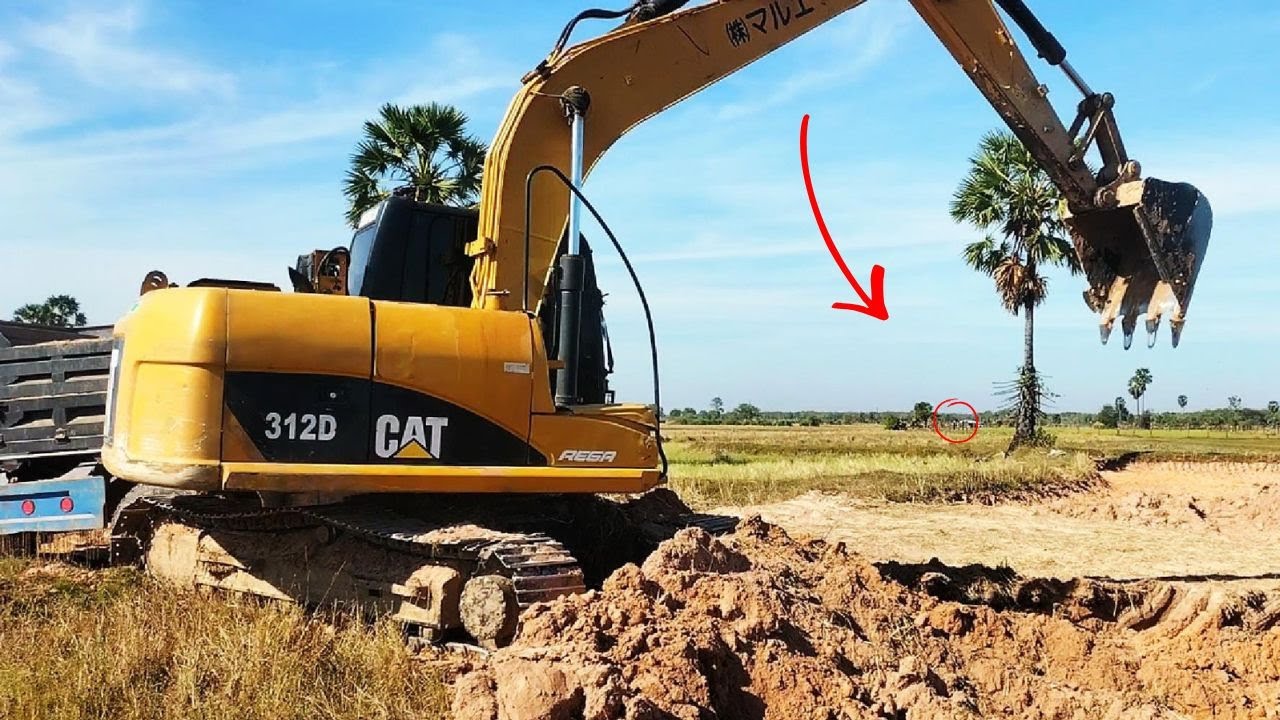 Excavator and Dump Truck Working Together | Heavy Equipment in Action