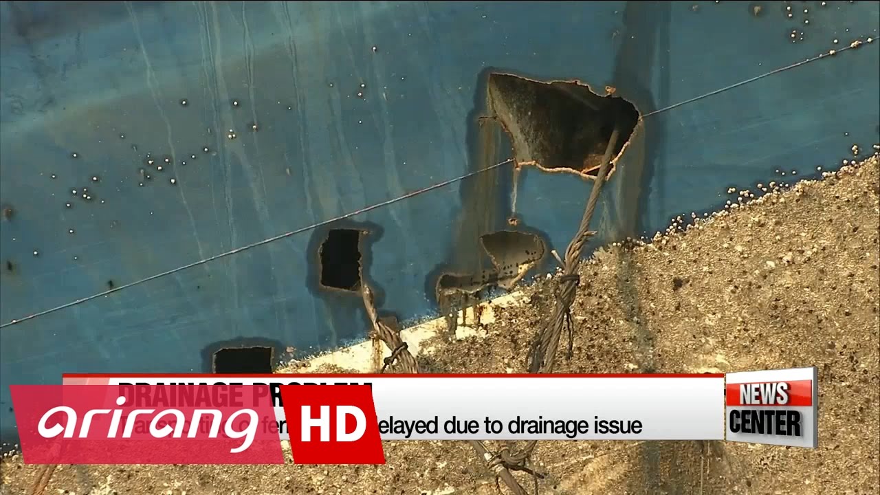 Salvaging operation continues...draining becomes a problem