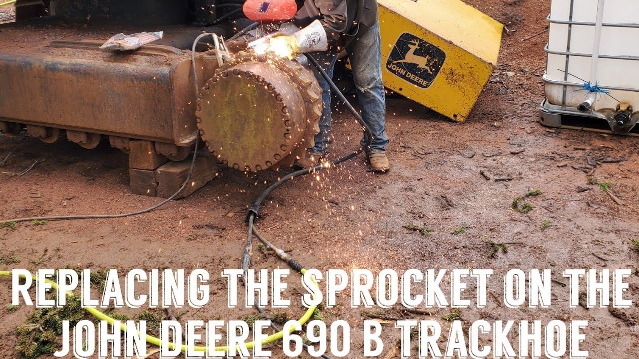 Replacing the sprocket on a John Deere 690 B trackhoe