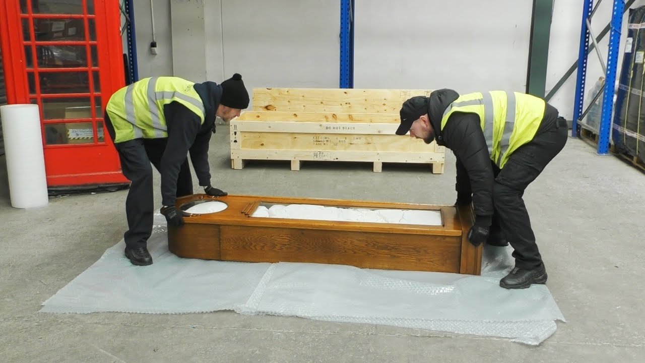 Packing and Crating an Antique Longcase Clock - International Removals