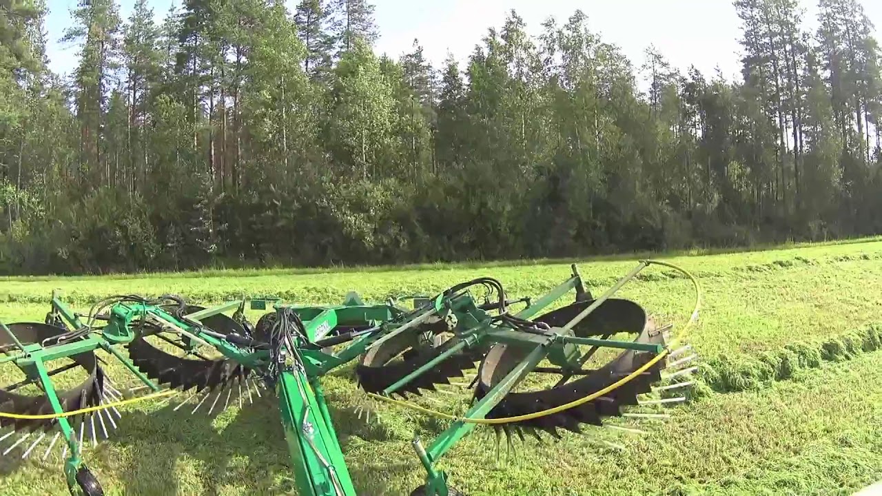 Agronic WRT 900 Four Rotor Rake pulled by Valtra 1