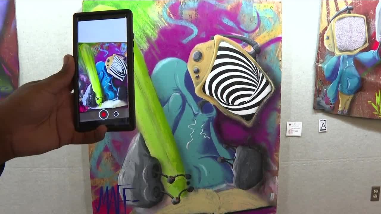 Brandon artist uses phones to bring paintings to life