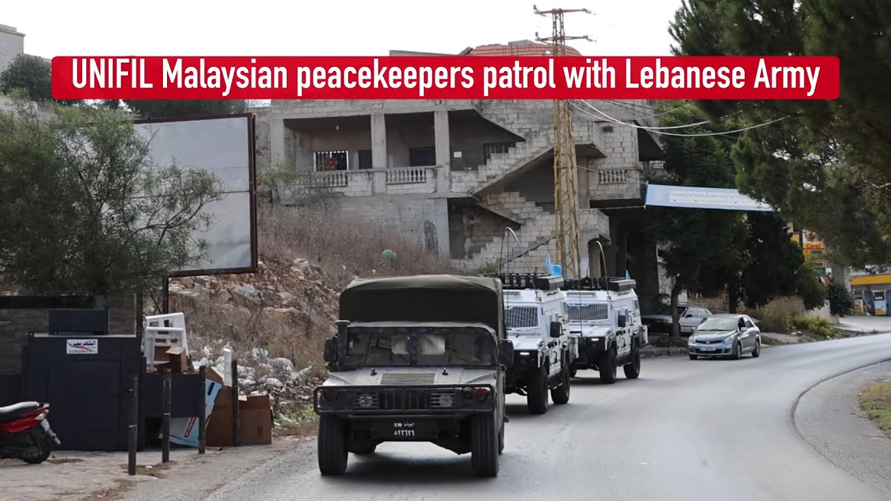 UNIFIL Malaysian peacekeepers patrol with Lebanese Army