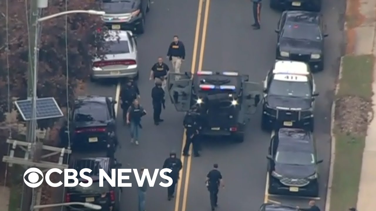 Manhunt after 2 police officers shot and wounded in Newark, New Jersey