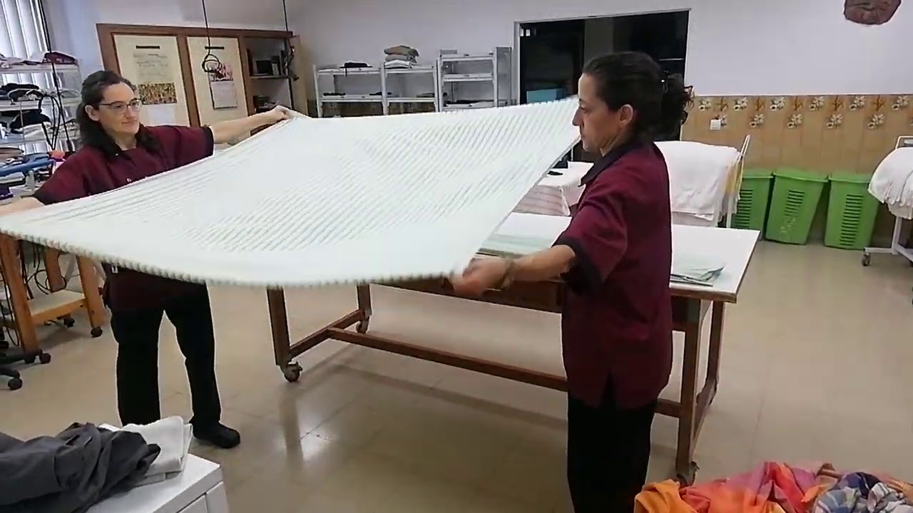 Cómo doblar sábana encimera