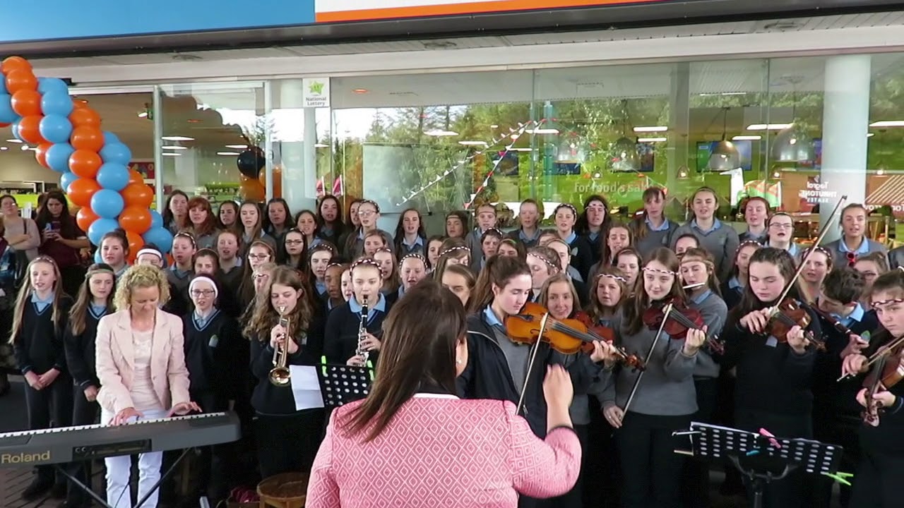 Students from Presentation College Headford sing and play The West's Awake/The Green & Red of Mayo