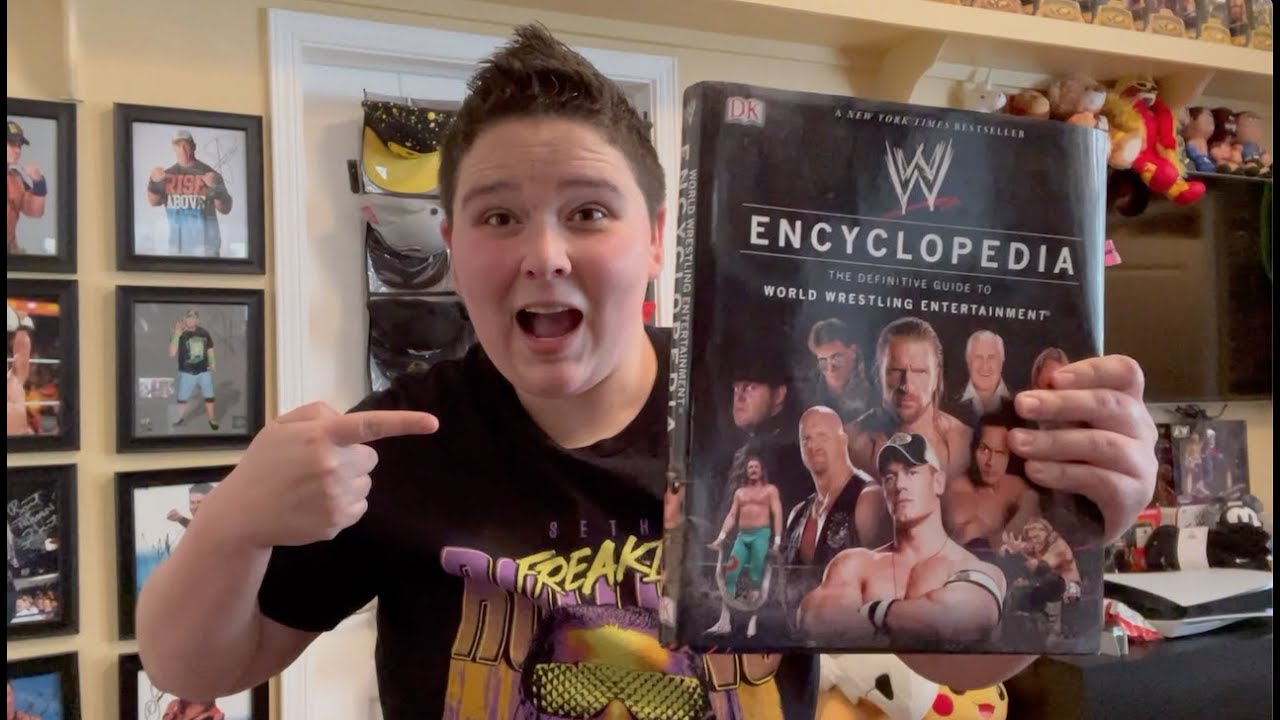 WWE AUTOGRAPHS IN MY 1ST EDITION WWE ENCYCLOPEDIA!!