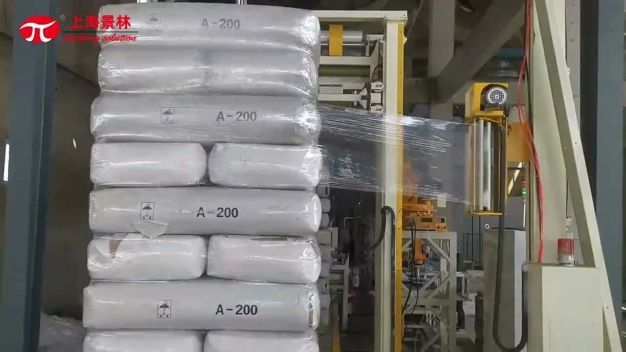 Automatic pallet wrapping machine on conveyor