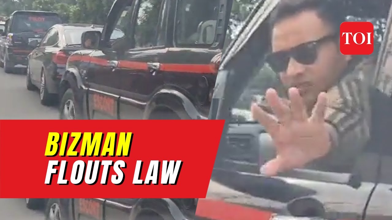 Businessman stops traffic for allowing own convoy to pass, bouncers threaten man recording video