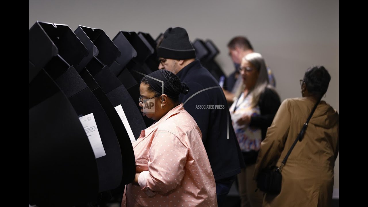 AP VoteCast: Economy ranked as a top issue, but concerns over democracy drove many voters to polls