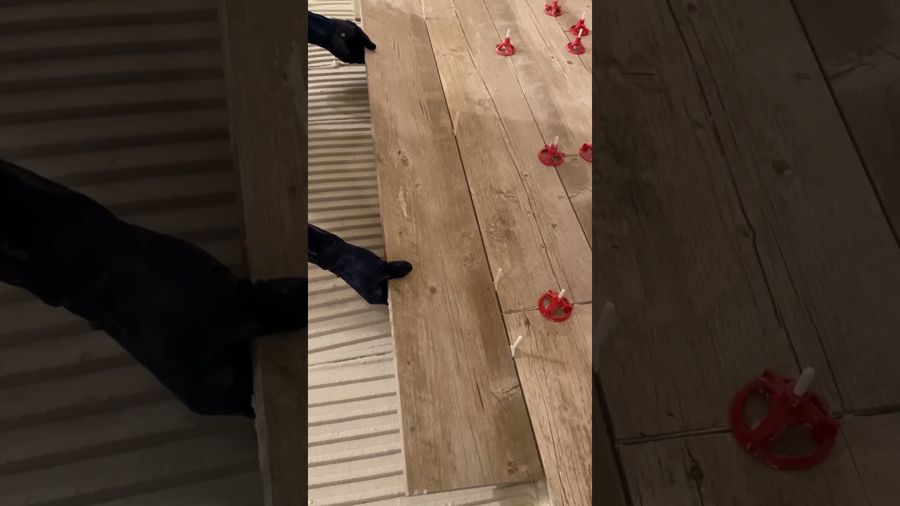 Installing wood look tile #youtubeshorts #shorts #tile #flooring