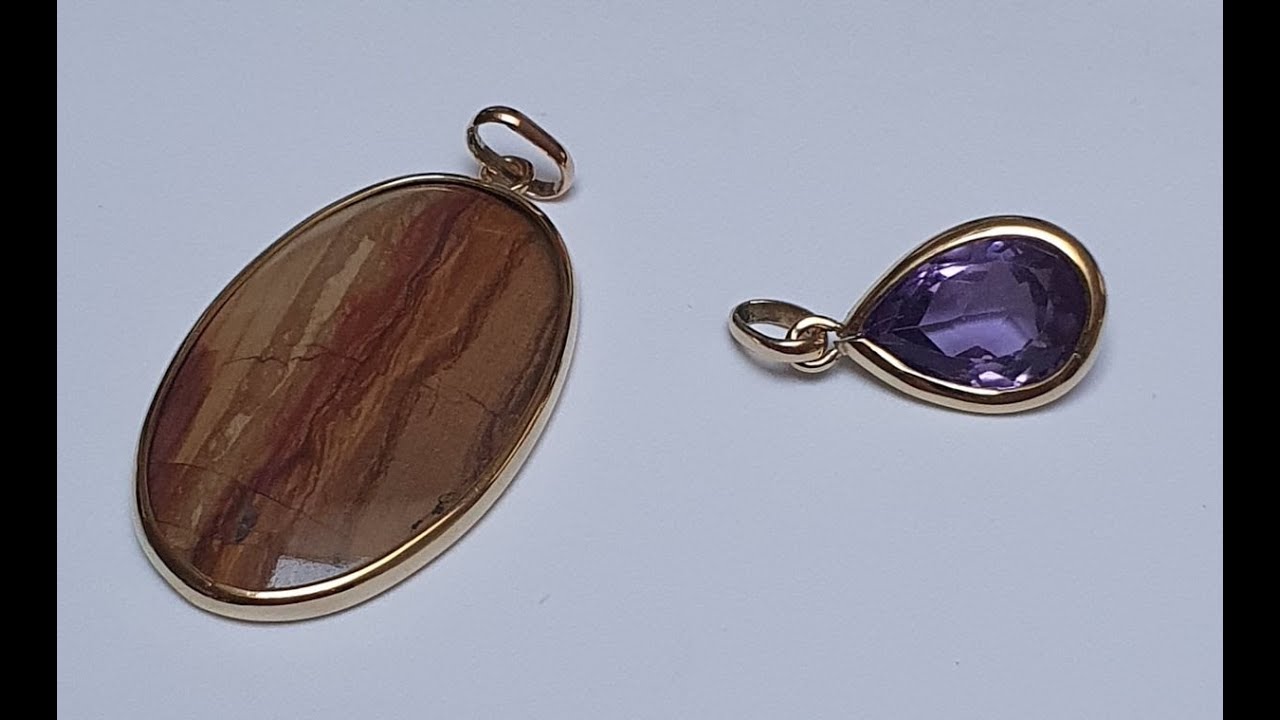 18KT gold pendant with a gem handmade.