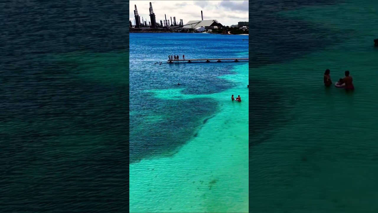 Pier by the turquoise sea 🌊 #ocean #sea #water #beach #island #waves #nature #coast #shorts