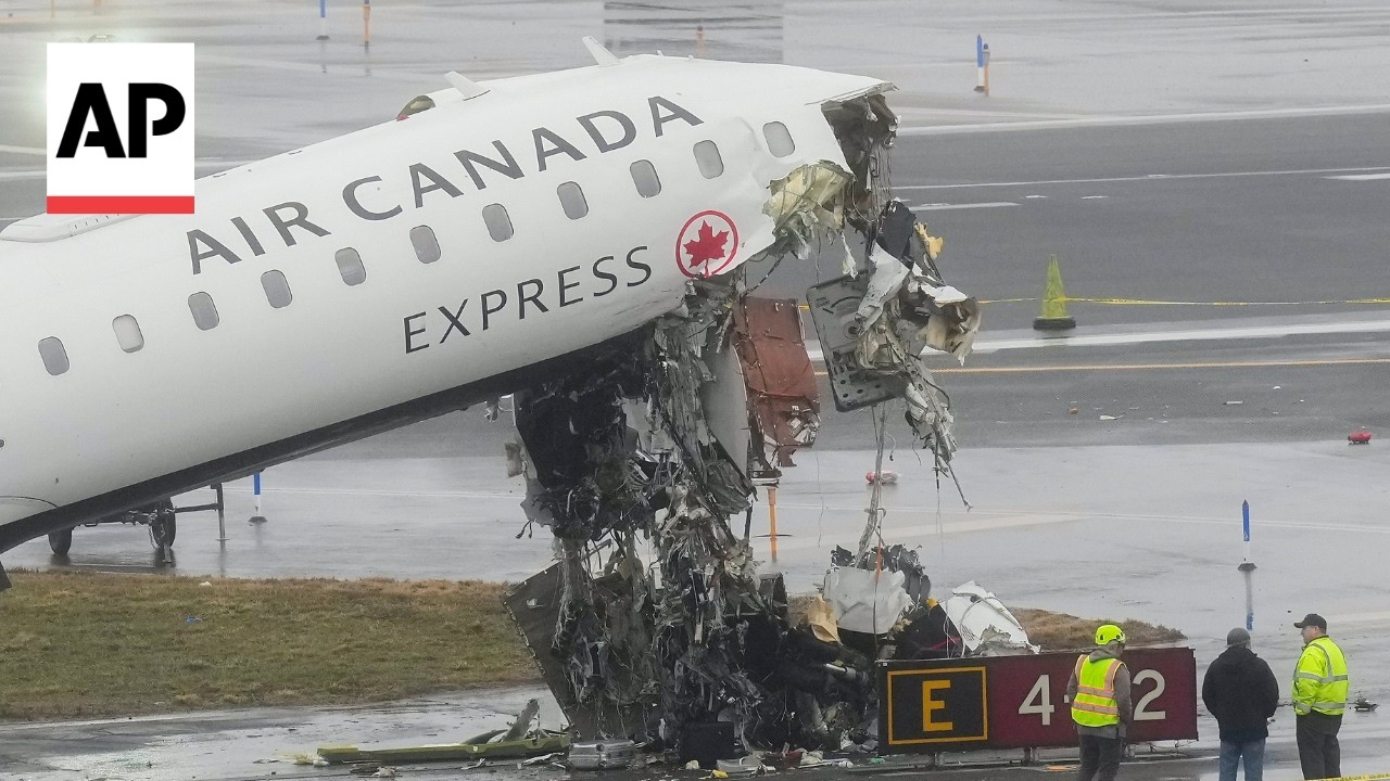 2 pilots killed after plane crashes with fire truck at LaGuardia Airport