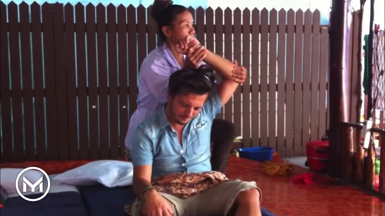 Yuri's first and last thai massage (on the beach in Thailand)