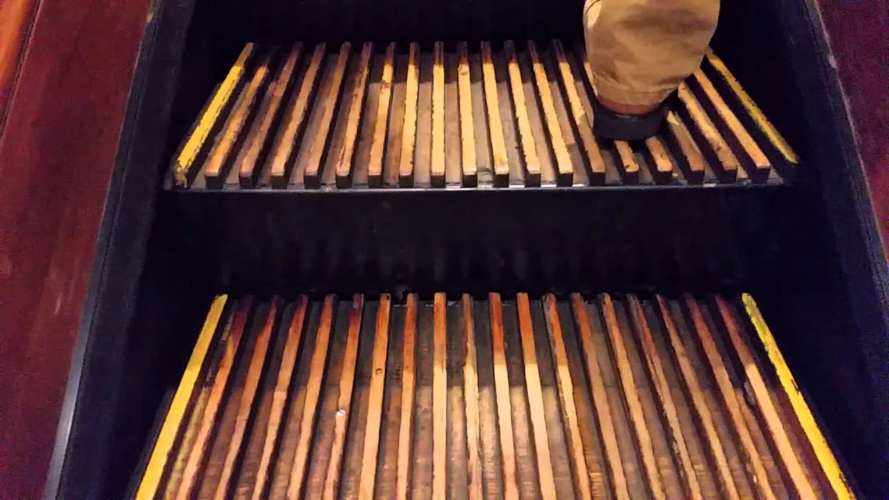 Vintage Otis wooden escalators at Macy's Herald Square
