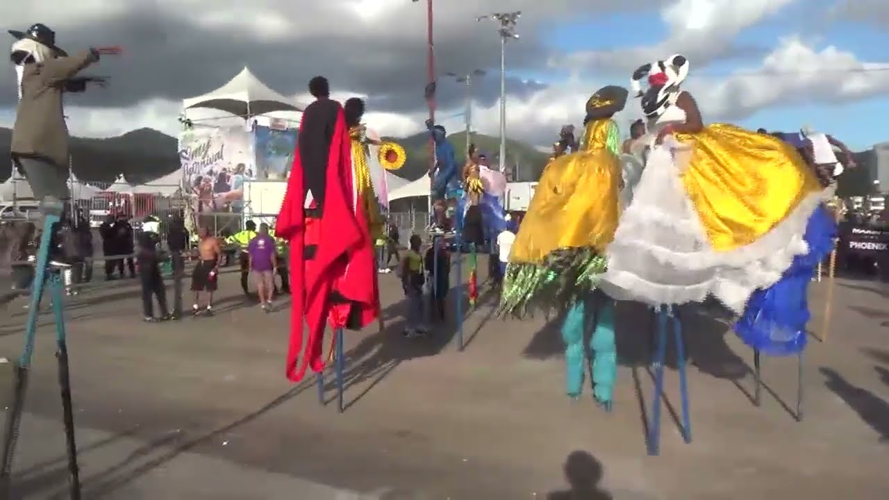 Moko Jumbies Crossing the Stage - Carnival Tuesday 2025