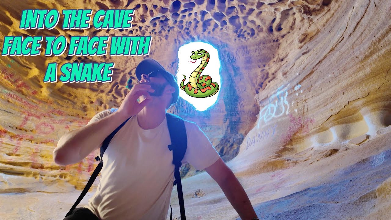 Into the cave, face to face with a snake!
