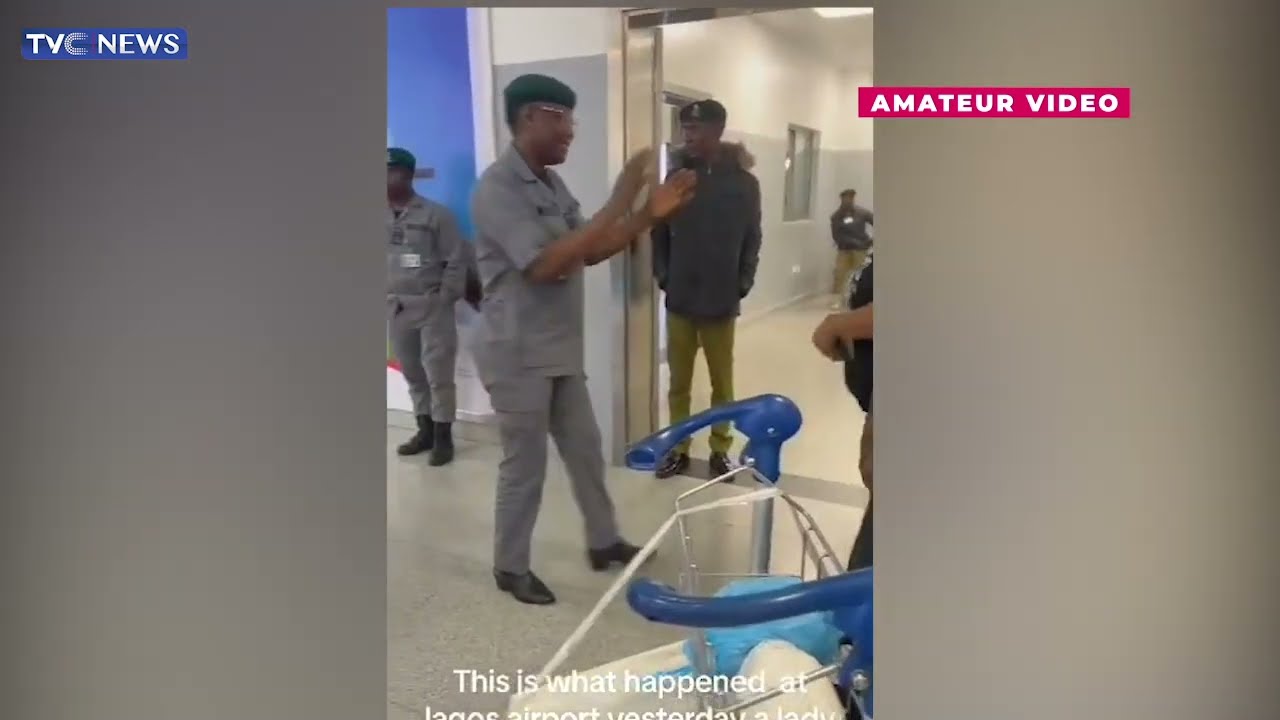 WATCH: Woman Destroys Husband's International Passport As They Arrive Lagos Airport