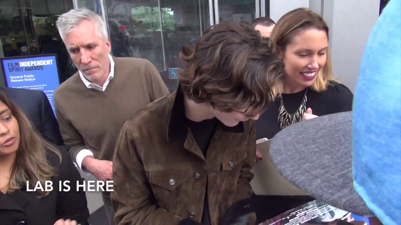 Timothée Chalamet is seen signing autographs and taking photos with a plethora of his fans and he p