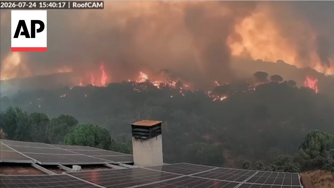 Cameras capture the scene in Spain as country battles historic wildfires