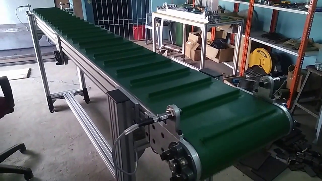 Orange Conveyor Systems - Cleated Belt Conveyor