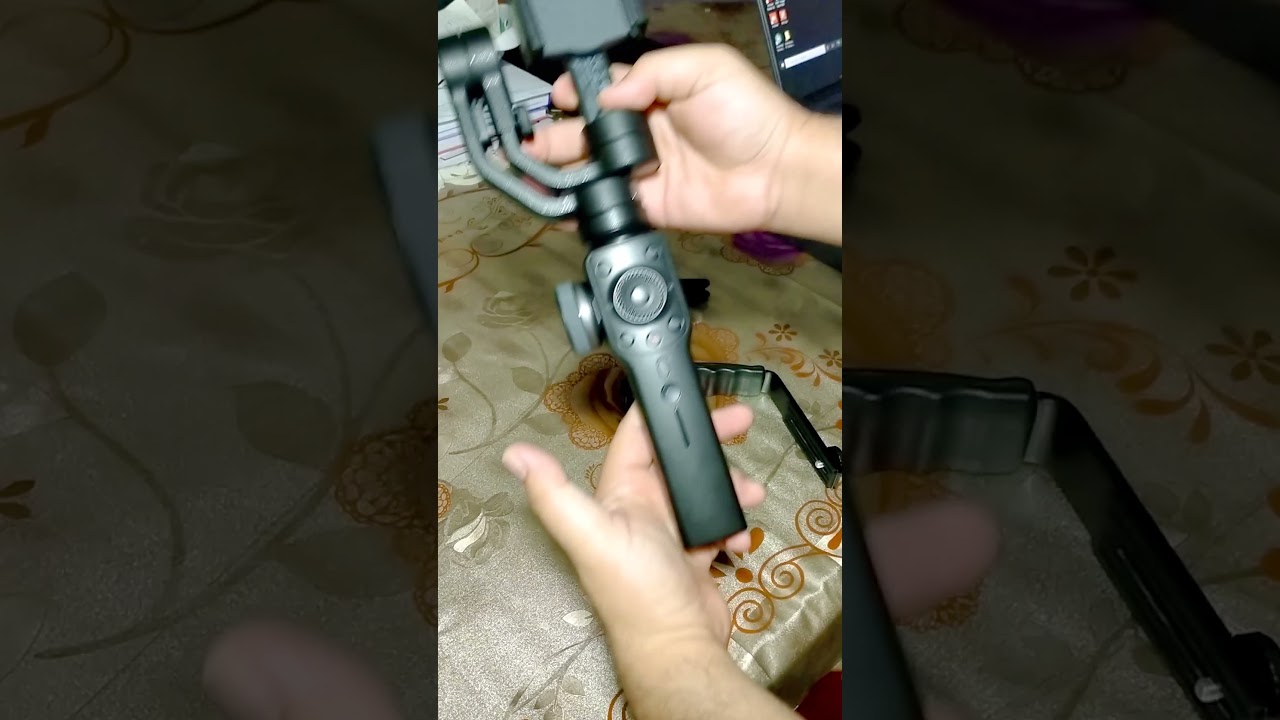 Zhiyun Smooth 4 with accessories & charging.