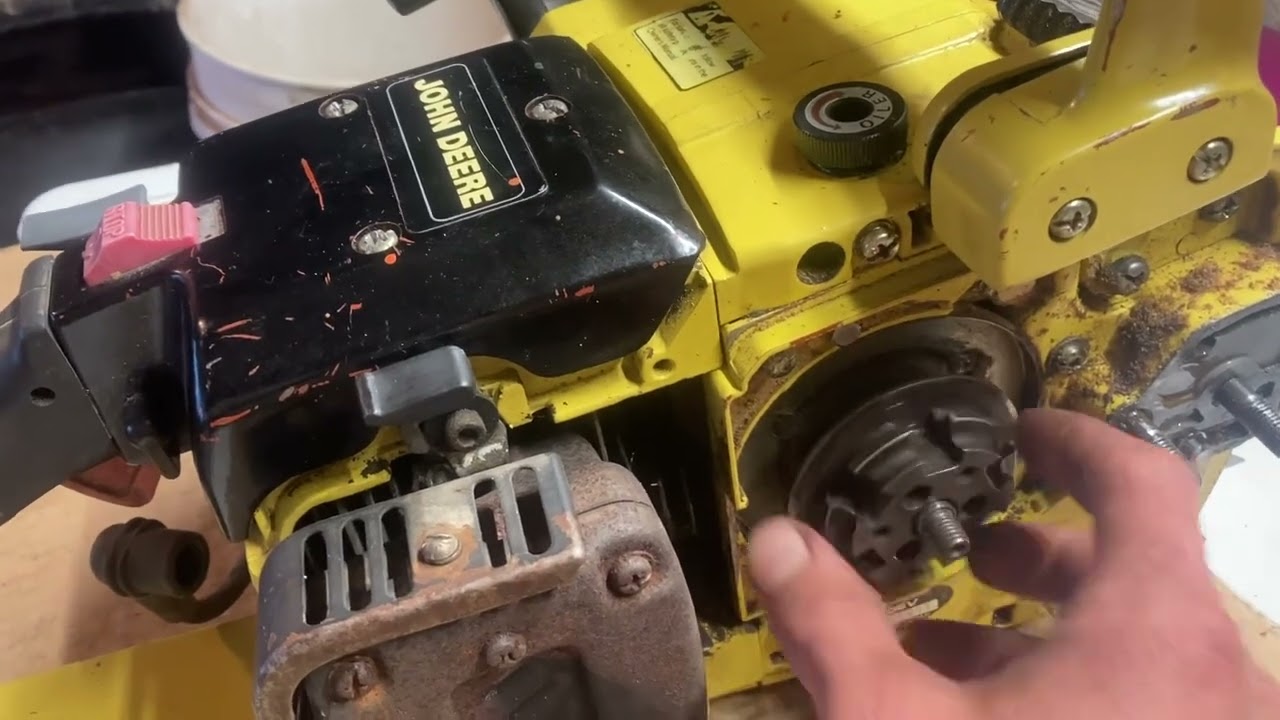 Ремонт и проверка сцепления бензопилы John Deere 80EV