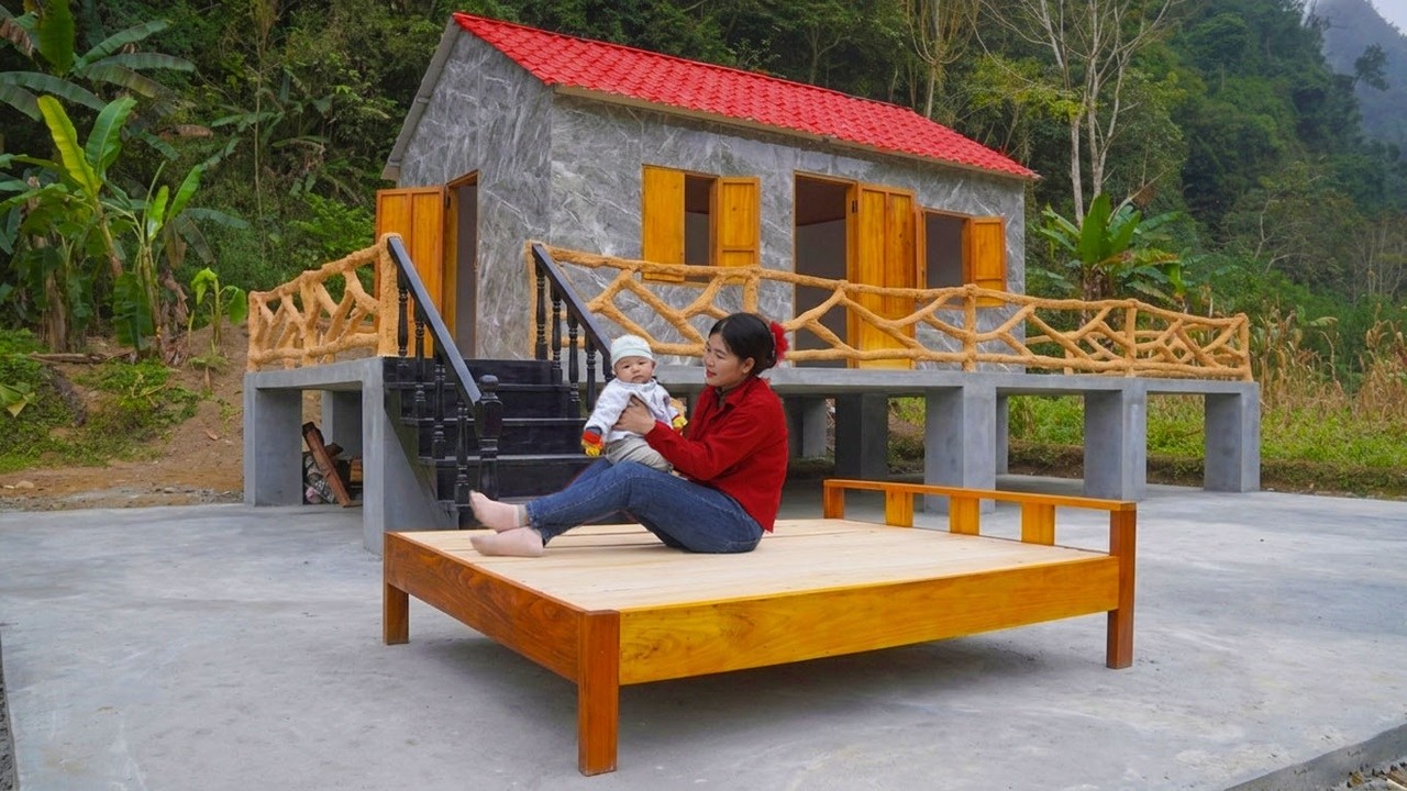 Lieu and her two-month-old son built a wooden bed and bought new blankets and mattresses.