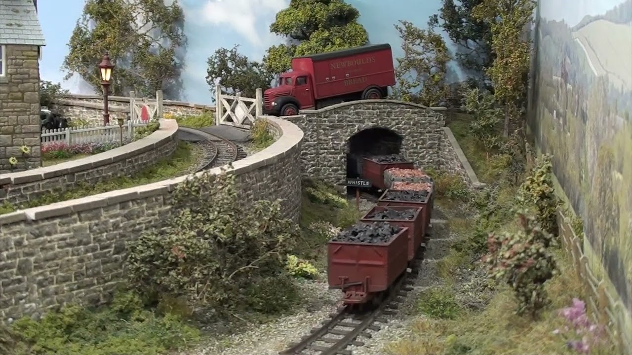 Minitrains 0-4-0 with wagons.