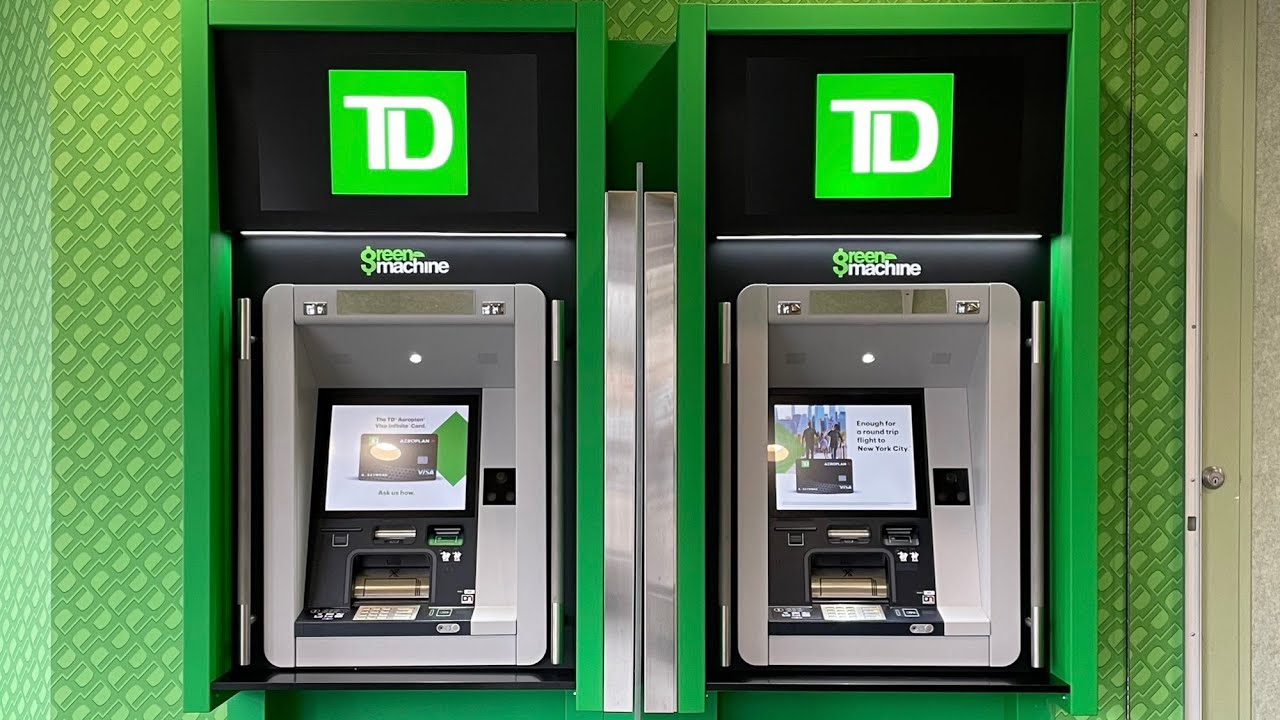 Withdrawing a $20 bill using the new TD Canada Trust Green Machine ATMs Vancouver, BC - May 25, 2024