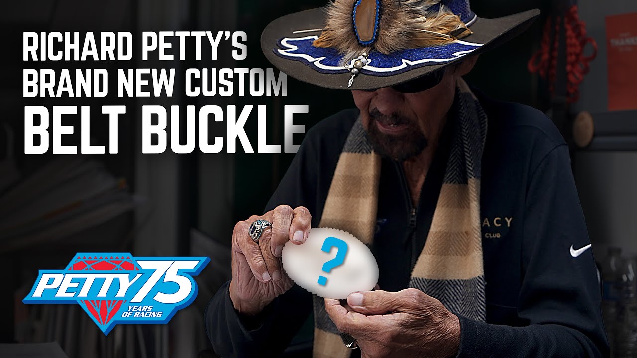 Richard Petty is presented with his brand new belt buckle for 2024
