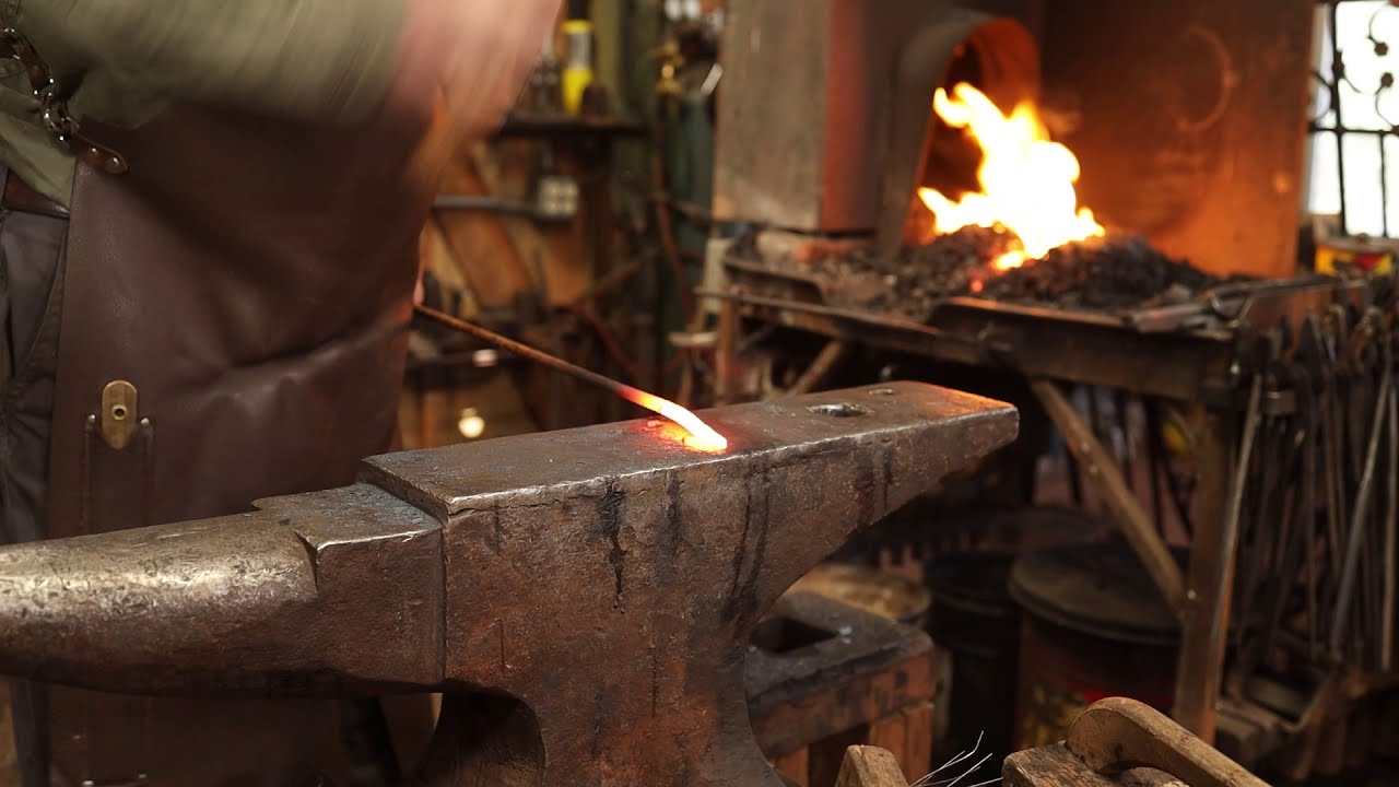 Forging a fire poker with wrapped eye