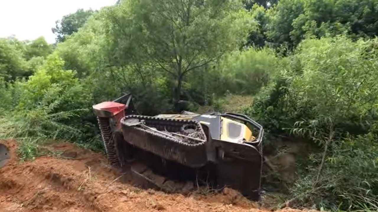 Rolled the ASV and got her stuck in a creek bed