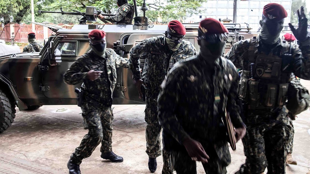 Guinea coup leader will not bow to pressure to let the president leave
