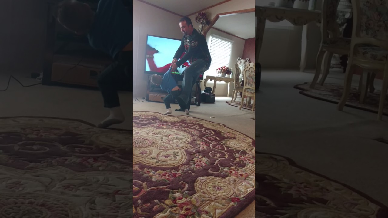 Dad and Tommy play fight