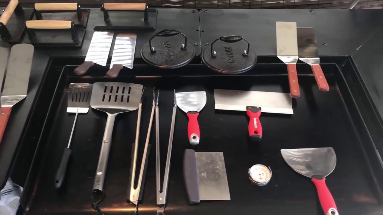 Tools and mods for the Blackstone Griddle including spatulas, tongs, food press, and thermometer